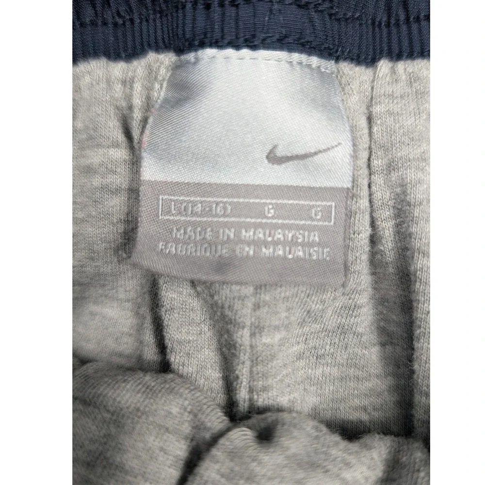 Nike‎ Kids Cargo Pants Lined Blue Gray Logo Pocket Zip Legs Size L 14-16